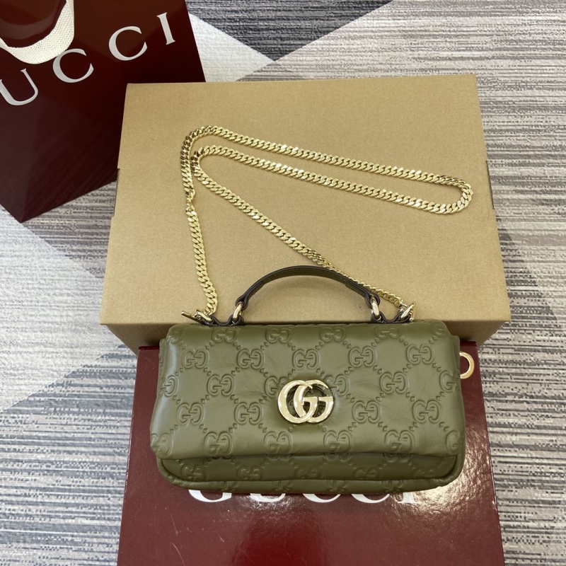 G*u*i top handle bags